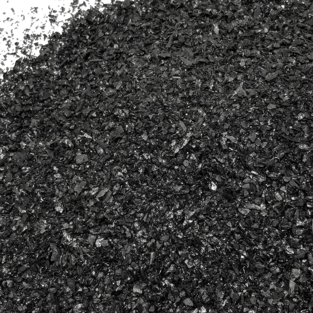 Close-up of black tourmaline sand. 